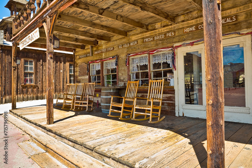Traditional wooden chairs in a wooden patio Calico - ghost town and former mining town in San Bernardino County - California, United States - Wild west lifestyle