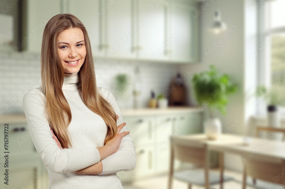 cute lady with cross hands posing at background