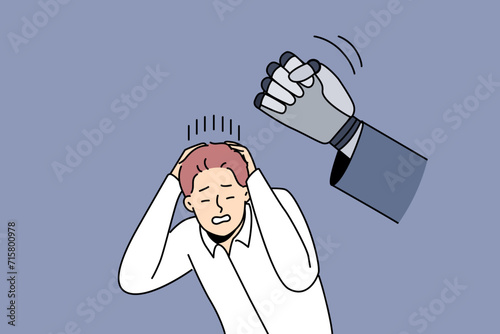 Robot punishes worker by punching man in office clothes, for concept of replacing humans with AI. Dystopia caused by rapid implementation of business processes and replacement of personnel with robot