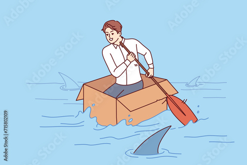 Brave business man shows no fear, overcoming crisis and floating in box in river with sharks. Ambitious guy strives for success in business without paying attention to risks and dangers along way