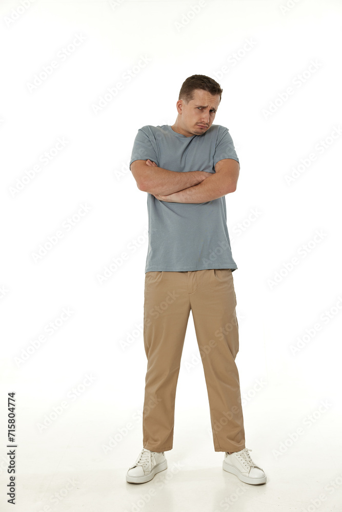 offended frustrated young man on white background. sadness offended frustrated young man on white background. sadness