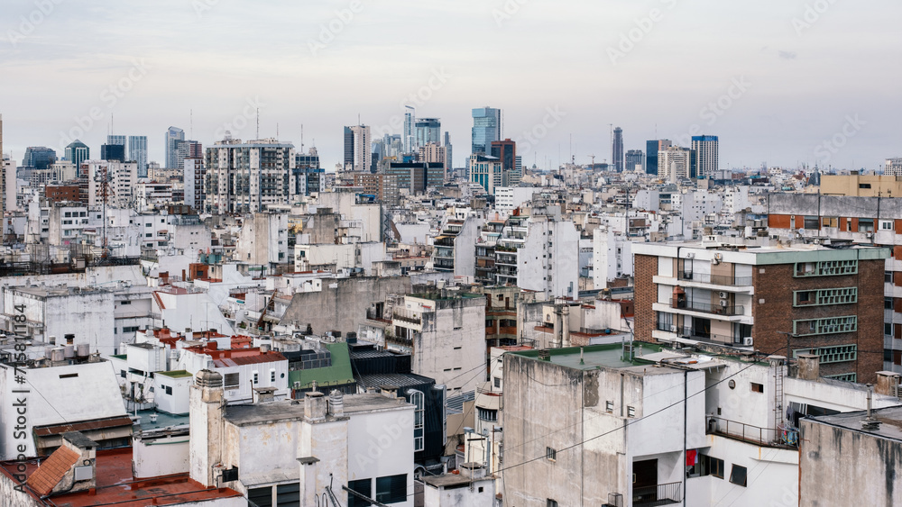 Dynamic Urban Mosaic: A Tapestry of Rooftops, High-Rises, and Cable Lines in the Heart of the City Dynamic Urban Mosaic: A Tapestry of Rooftops, High-Rises, and Cable Lines in the Heart of the City