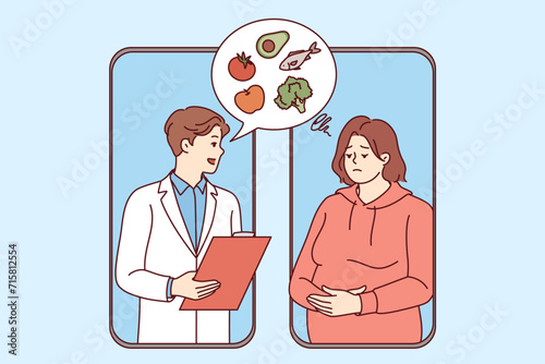 Man nutritionist provides online consultation services for woman with excess weight problems through mobile phone application. Online nutritionist recommends diet of vegetables and fish to patient.