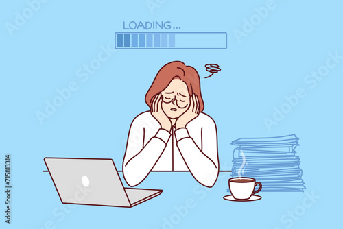 Slow woman office worker sleeping at workplace with laptop and papers due to lack of energy, sitting near progress bar loading. Slow girl cannot start work due to sleepiness or working overtime.