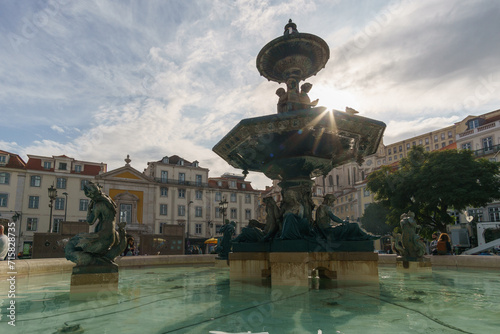 View of Fonte Sul do Rossio Fountain at Plaza Dom Pedro IV in the city center of Lisbon, Portugal photo