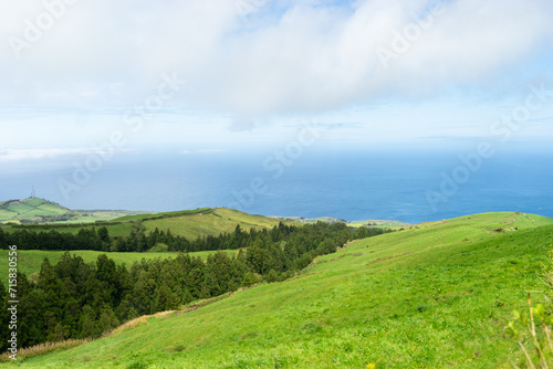 green hills against the background of the ocean on the island of Sao Miguel, Azores