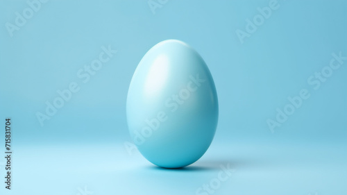 One pastel colored easter eggs on a isolated blue background 