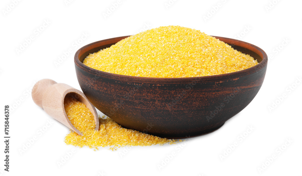 Raw cornmeal in bowl and scoop isolated on white Raw cornmeal in bowl and scoop isolated on white