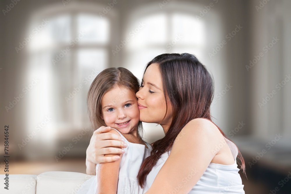 portrait of beautiful mother kissing her child portrait of beautiful mother kissing her child