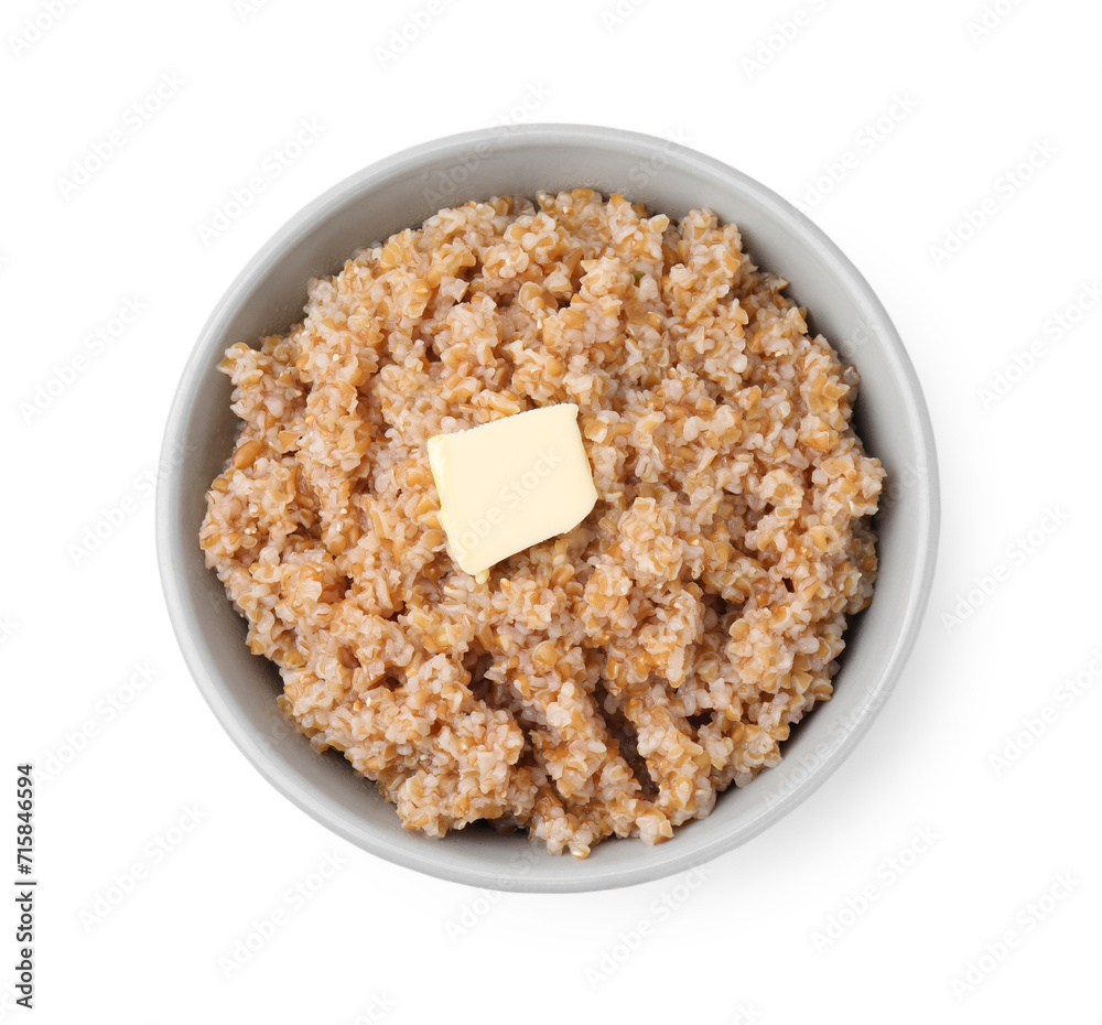 Tasty wheat porridge with butter in bowl isolated on white, top view Tasty wheat porridge with butter in bowl isolated on white, top view