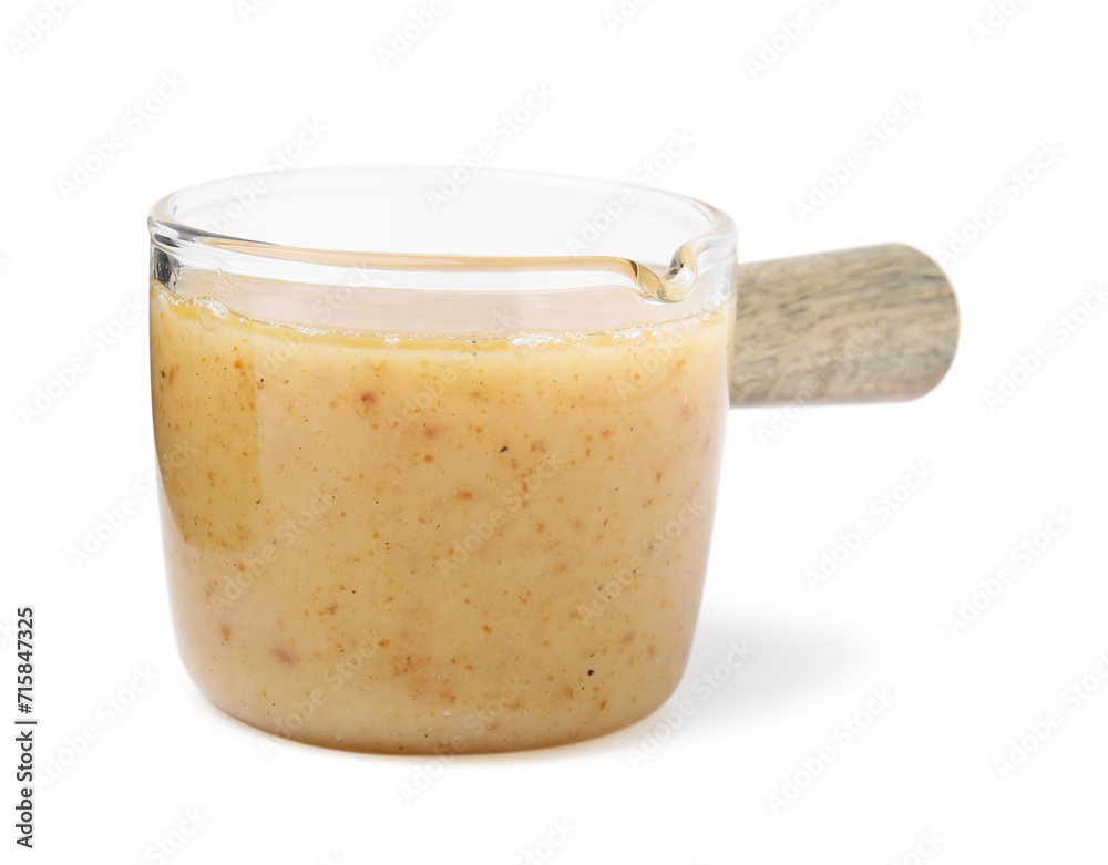 Delicious turkey gravy in glass saucepan isolated on white Delicious turkey gravy in glass saucepan isolated on white