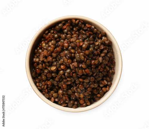 Delicious lentils in bowl isolated on white, top view