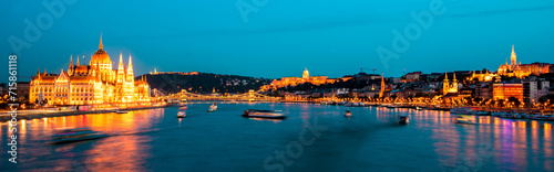 The picturesque landscape of the Parliament  the famous Szechenyi chain bridge over the Danube  Fishermen s Bastion in Budapest  Hungary at night. Panorama viev. Charming places.
