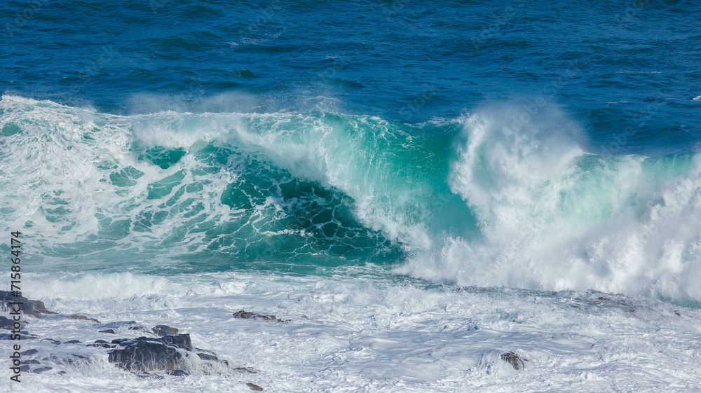 High waves crashing ashore in Hawaii