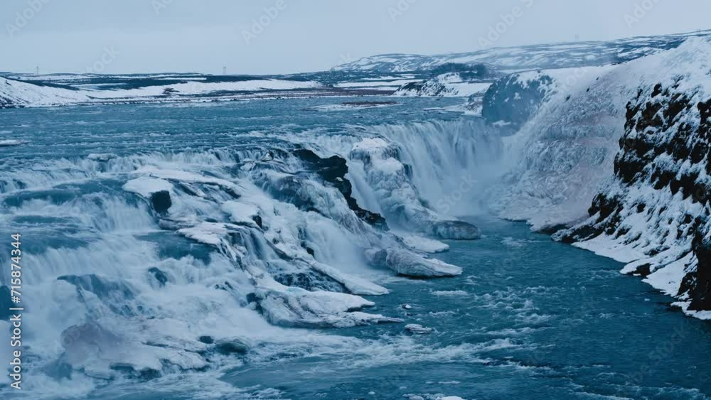Gullfoss waterfall in Iceland covered with snow and ice Gullfoss waterfall in Iceland covered with snow and ice