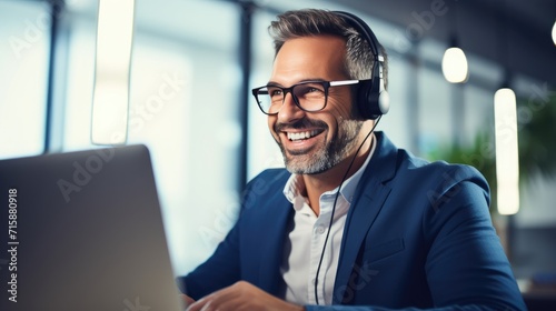Call center workers. Smiling customer support operator with hands-free headset working in the office photo