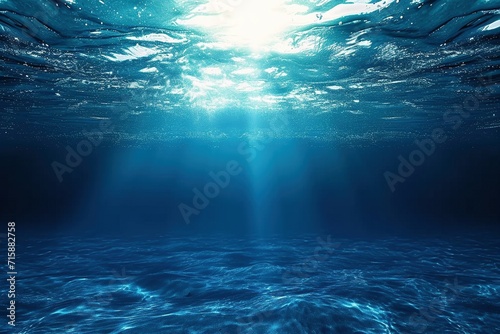 Submerged Tranquility: Dark Blue Oceanic Surface Seen Below Water photo