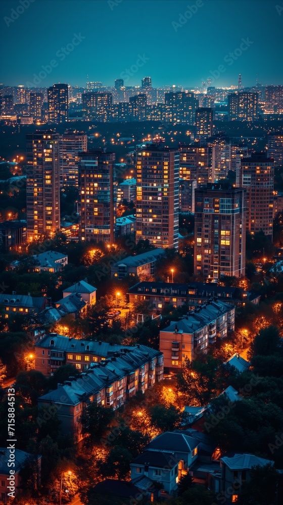 Vibrant city lights at night, urban landscape aerial view