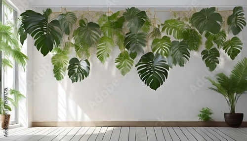 decorative tropical leaves hanging from top to bottom photomural on the wall or home interior photo