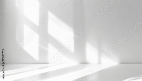 realistic and minimalist blurred natural light windows shadow overlay on wall paper texture abstract background minimal abstract light white background for product presentation