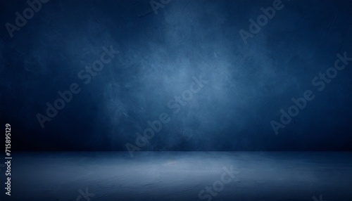 empty dark blue abstract cement wall and studio room with smoke float up the interior texture for display products wall background photo