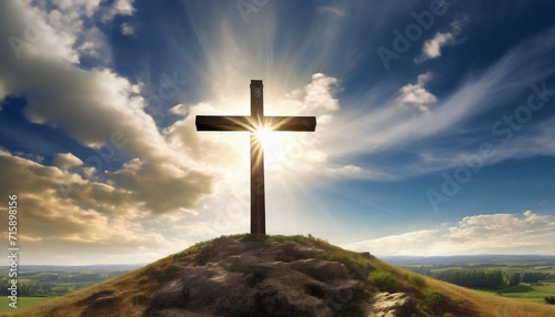 holy cross of jesus christ with the sky over golgotha hill is shrouded in light and clouds