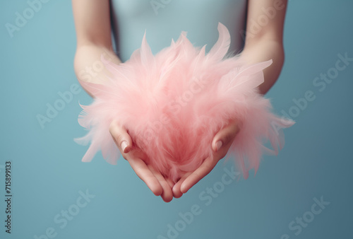 Girl with hands full of feathers.Minimal creative nature and fashion concept.Top view,copy space.Generative Ai