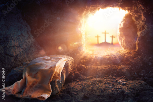 Resurrection Of Jesus Christ  - Empty Tomb -  Focus On Shroud And Defocused Crosses On Background With flare Lights Effects