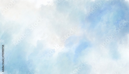 watercolor background in blue and white colors soft pastel color splash and blotches with fringe bleed painting in abstract clouds shapes with paper texture photo