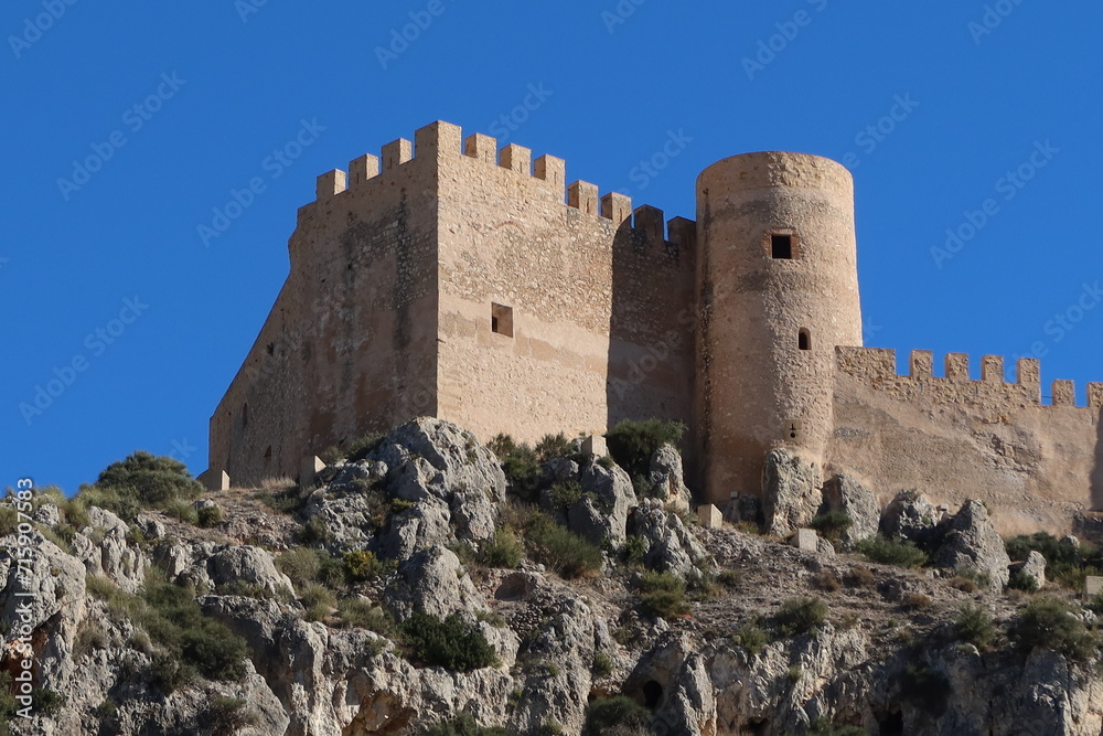 Castalla, Alicante, Spain, January 22, 2024: Side detail of the Castalla Castle of Islamic origin. Eleventh century. Castalla, Alicante, Spain