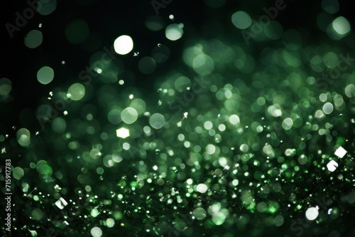  a blurry photo of a green background with lots of small circles of light on the top of the image.