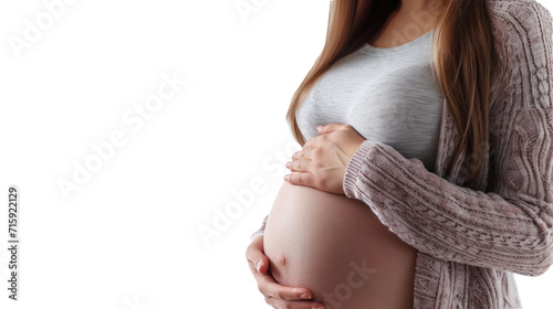 Pregnant woman gently holding her belly, no face, poster, banner, copy space.  photo