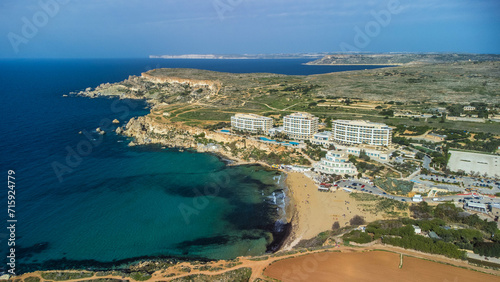 Fototapeta Naklejka Na Ścianę i Meble -  Aerial view near Radisson Blu Resort over Golden Bay in Mellieħa, Malta