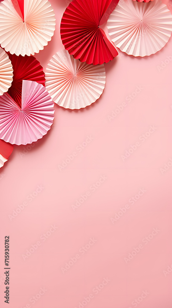 Φωτογραφία Valentine day background with sweet love pink and red paper hearts of asian fans in modern fashion style soar on cute soft light pastel pink backdrop, sideways border, copy space, top view, vertical