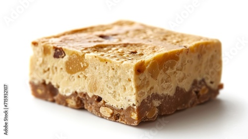 Slice of halva, natural colors. Isolated on white background. Delicious traditional oriental sweet made from nuts.