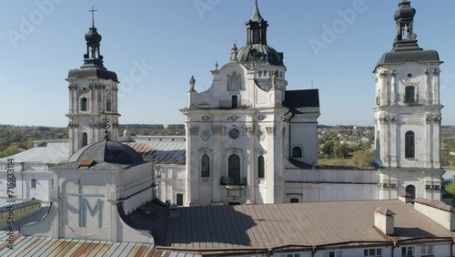 Aerial drone lift footage of Monastery of the Bare Carmelites in Berdychiv, historic city in Zhytomyr Oblast, Ukraine. photo