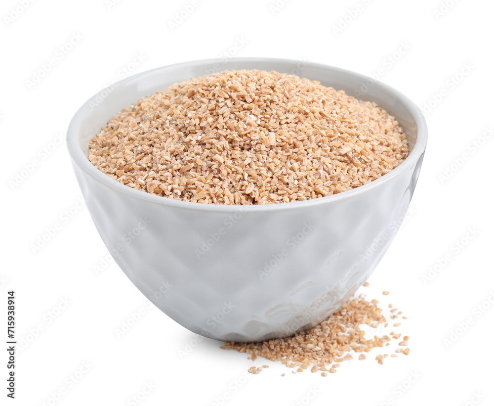 Dry wheat groats in bowl isolated on white Dry wheat groats in bowl isolated on white