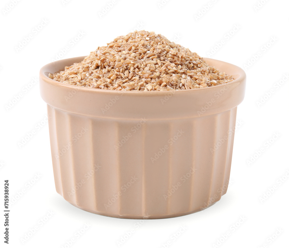 Dry wheat groats in bowl isolated on white Dry wheat groats in bowl isolated on white