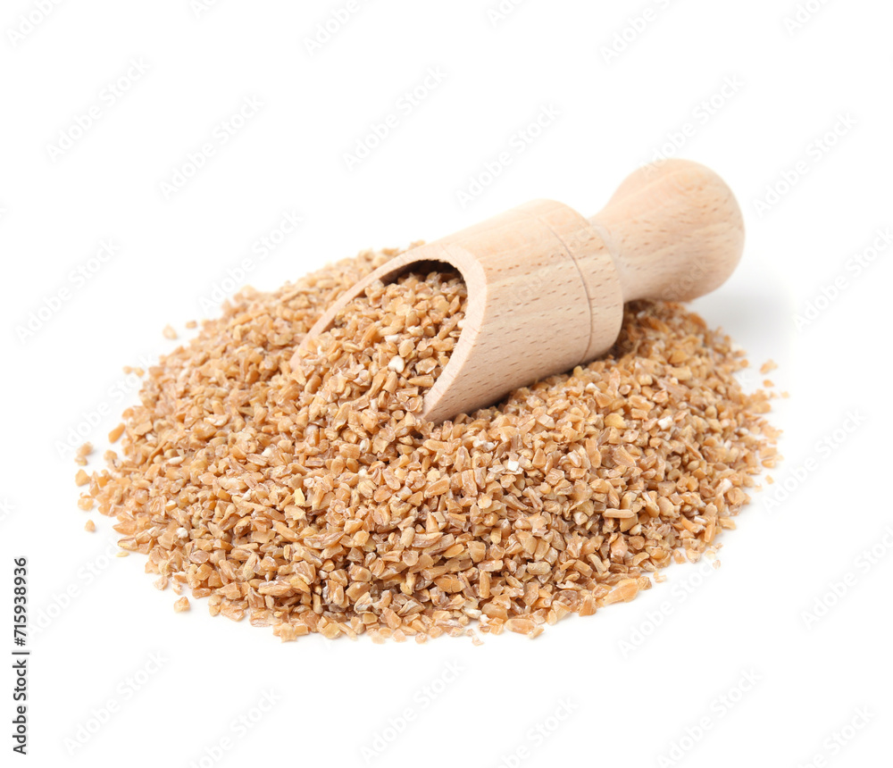 Pile of dry wheat groats and scoop isolated on white Pile of dry wheat groats and scoop isolated on white