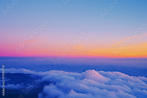A sunrise scene above clouds, in the style of multicolored landscapes, mountainous vistas.