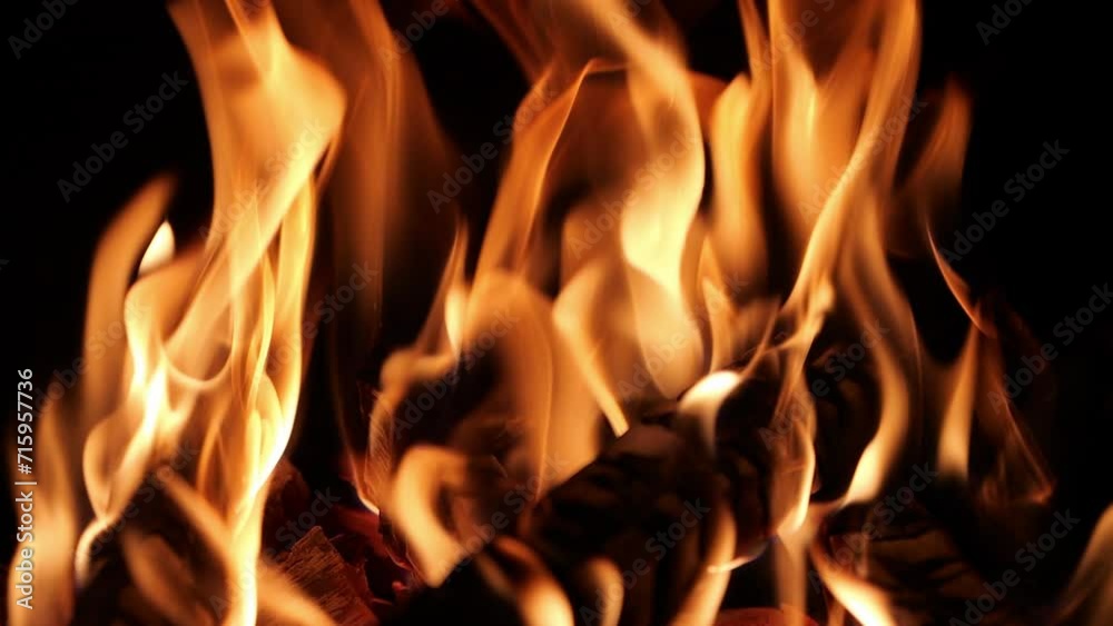 Flames and fire from burning wood. Bonfire made of wood and charcoal. Flammable environment. Warmth from the fire in the fireplace. Flames and fire from burning wood. Bonfire made of wood and charcoal. Flammable environment. Warmth from the fire in the fireplace.