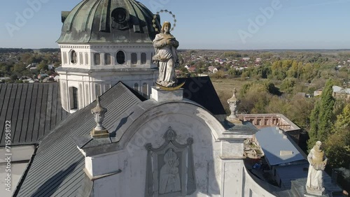 Aerial drone crane up rising close up footage of a detail of  Monastery of the Bare Carmelites in Berdychiv, historic city in Zhytomyr Oblast, Ukraine. photo