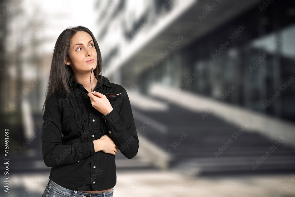 Caucasian female walking around city street Caucasian female walking around city street