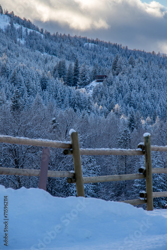 Snow-covered hills and forest along the Twisp River in the Methow Valley, Washington, USA photo