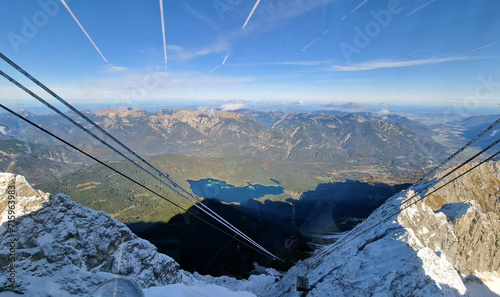 Great view of Lake Eibsee from the highest vantage point of the Zugspitze in wonderful weather