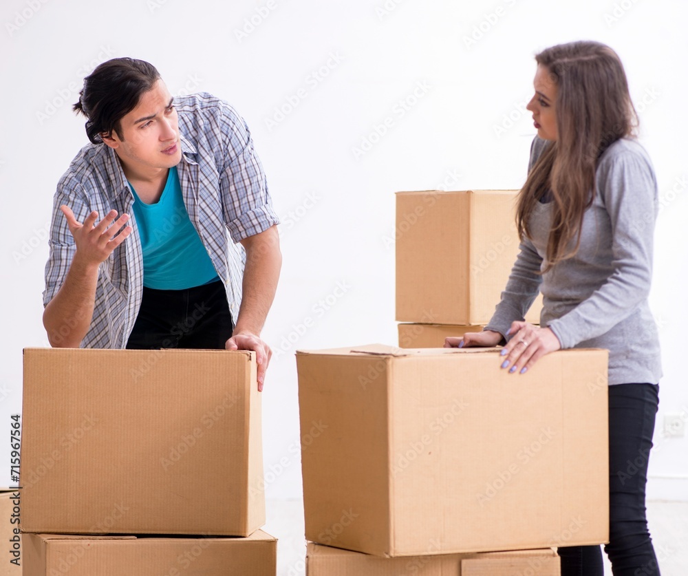 Young pair moving to new flat Young pair moving to new flat