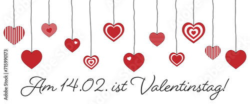 Am 14.02. ist Valentinstag - Schriftzug in deutscher Sprache. Banner mit hängenden Herzen. photo