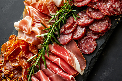 Sliced salami, jamon, prosciutto crudo or jamon. Meat platter with selection