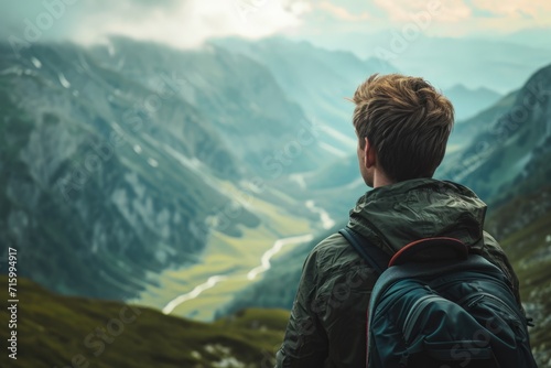 Fotografia, Obraz Man With Backpack Admiring Mountains