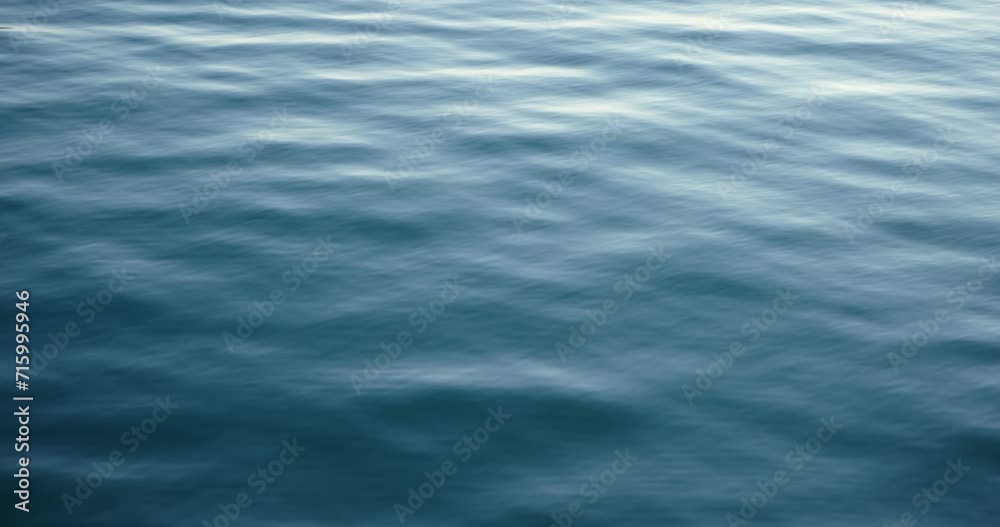 Waves in blue pure sea moving in slow motion. Concept of ecology
